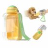 4a62a46d-0525-4029-bd0d-7533b26c4529.jpg Transparent yellow pet water bottle with a green strap; a golden retriever puppy reaches toward the yellow drinking bite valve.